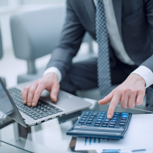 close up.businessman checking financial data.accounting and technology